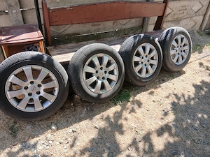 Cauciucuri de vară + genți de aluminiu Opel