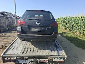 Dezmembrez Opel Astra j  - imagine 2
