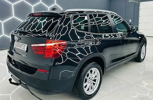 Bmw Seria X - imagine 4