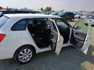 Scoda Fabia 2011 1.6 tdi - imagine 4