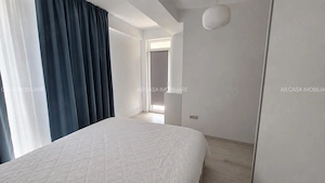 Închiriez apartament nou, mobilat, utilat, 3 camere, 2 băi, garaj subteran, terasă mare, boxă - imagine 11