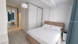 Închiriez apartament nou, mobilat, utilat, 3 camere, 2 băi, garaj subteran, terasă mare, boxă - imagine 5
