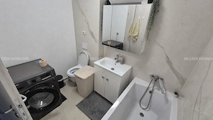 Închiriez apartament nou, mobilat, utilat, 3 camere, 2 băi, garaj subteran, terasă mare, boxă - imagine 10
