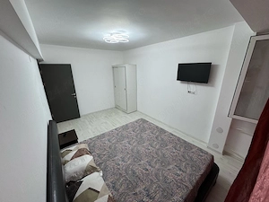  Regim Hotelier - Apartament cu doua camere  parter, zona f buna, vedere pe fata, decomandat - imagine 4