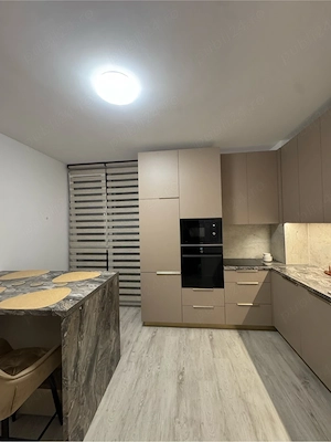apartament 2 camere,decomandat,57mp,bucatarie separata,bloc nou,torontal,parcare subterana - imagine 5