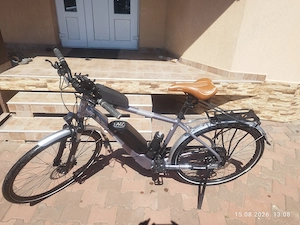 Vând bicicleta electrica raleigh array sr suntour
