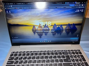 laptop lenovo ideapad 5 , functioneaza perfect dar are rama despipita intr o parte