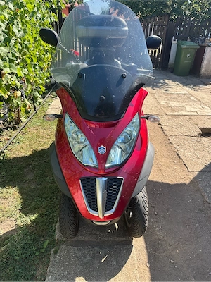 piaggio mp3 lt 400 se conduce cu B