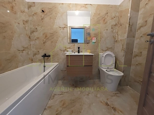 Apartament la parter cu balcon. Bucatarie separata. Loc de parcare - imagine 3