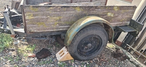  Pret negociabil .Remorca dupa tractor cu foi de arc si frana pe protap plus roata de rezerva