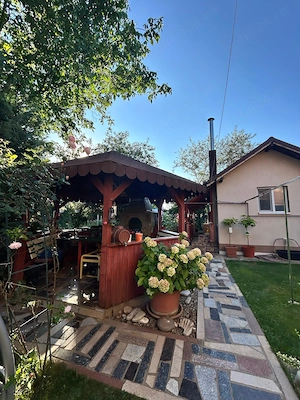 Casa 4 camere si teren de 1000 mp, garsoniera separata, foisor,carport - imagine 5