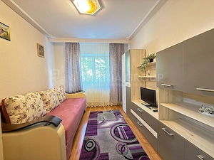 Apartament cu 2 camere, 2 bai, decomandat, etaj 1 - zona Racadau - imagine 5