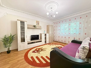 Apartament cu 2 camere, 2 bai, decomandat, etaj 1 - zona Racadau