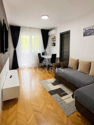 Apartament cu 3 camere, semidecomandat, zona Dacia - imagine 2