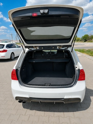 BMW E91 2012 318D - imagine 6