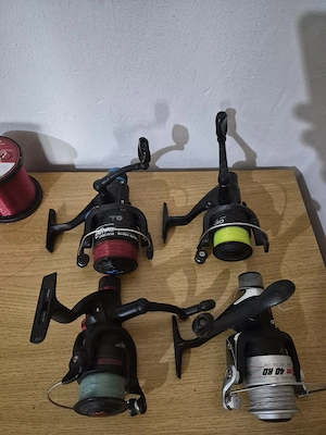 Pachet 4 mulinete + fir Delphin Power Carp Line 1200 m