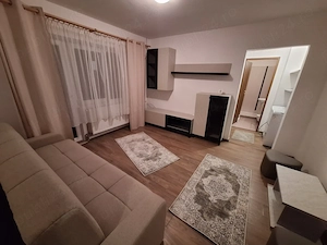 De închiriat apartament 2 camere - imagine 2