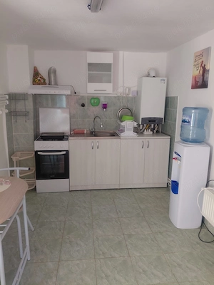 Ofer spre închiriere un apartament la casa   - imagine 7