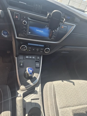 Vând Toyota Auris Touring Sports Hybrid, 1.8 benzina 136 cp Hybrid, facelift, fabricație 08 2014. - imagine 5