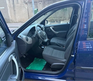 Dacia Logan 2009 1.4 benz. 17000 km reali Nerulata , Ținuta la garaj încalzit. stare NOUA ! - imagine 5
