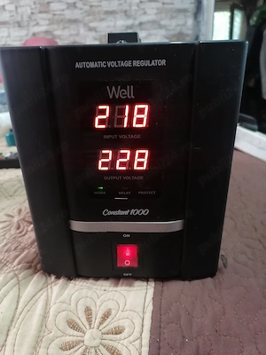 stabilizator  de  tensiube alternativa cu servomotor  WELL  de 1000 VA