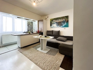 Apartament la pret de garsoniera cu gradina de 35mp + parcare