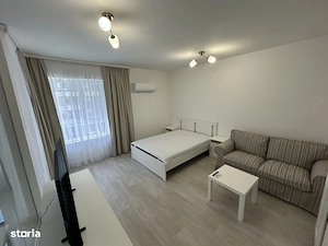 Garsoniera Akcent City , 3 min Metrou Jiului ,Parcare subterană inclus