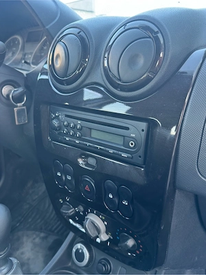 Dacia Duster 1,5 dci 4x4 km reali  - imagine 9