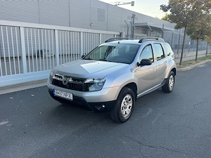 Dacia Duster 1,5 dci 4x4 km reali  - imagine 4