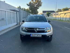 Dacia Duster 1,5 dci 4x4 km reali  - imagine 6