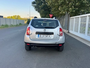 Dacia Duster 1,5 dci 4x4 km reali  - imagine 5