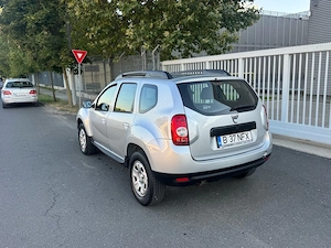 Dacia Duster 1,5 dci 4x4 km reali  - imagine 8