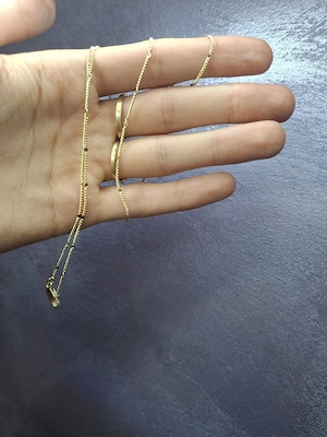 Vănd o sacoșică de bijuterii placate cu aur de 14K 
