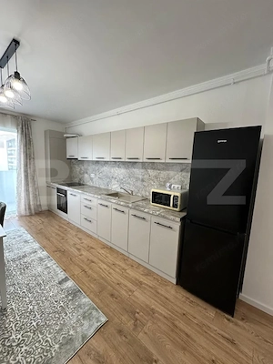 Apartament 2 camere, 44 mp + balcon 10.40 mp, parcare, zona Floresti - imagine 4
