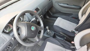 Vând Skoda Fabia Combi, an fabricație 2006, motor 1.2 benzină, 64 CP, jante+cauciucuri vară-iarnă - imagine 4