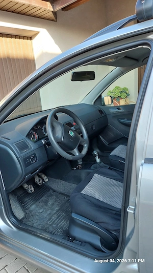 Vând Skoda Fabia Combi, an fabricație 2006, motor 1.2 benzină, 64 CP, jante+cauciucuri vară-iarnă - imagine 6