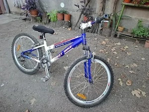 Bicicletă First Bike Solaris GTX 24 inch   Schimbătoare Shimano & Suspensie față