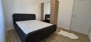 Oferim spre închiriere un apartament modern cu 2 camere, mobilat,situat în cartierul Tudor Vladimire - imagine 2