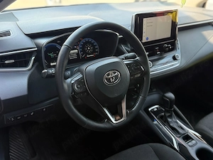 Toyota Corolla Hybrid+Gpl - imagine 7