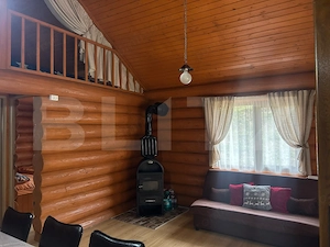 Cabana din bușteni - refugiu ideal în mijlocul naturii - imagine 6