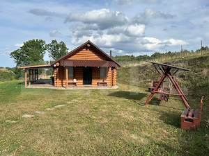 Cabana din bușteni - refugiu ideal în mijlocul naturii - imagine 3