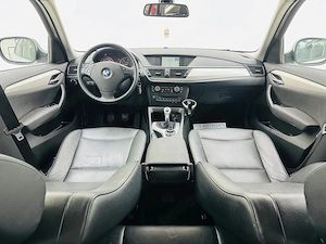 Bmw Seria X - imagine 6