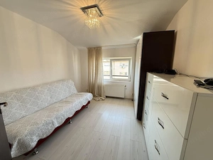 Apartament cu 3 camere, decomandat, 66 mp utili - Dambovita - imagine 3
