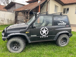 Suzuki Vitara Tracker 1.6 offroad - imagine 4