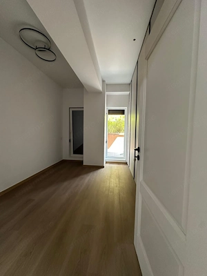 Apartament in Pipera la parter cu 4 camere, curte privată de 30 mp și 2 locuri de parcare - imagine 9