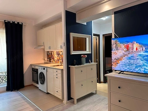 Studio de închiriat în Cosmopolis, loc de parcare inclus