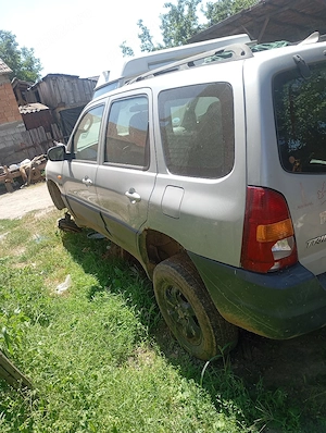 vind sau dezmembrez Mazda tribute 4x4 telefon   - imagine 2