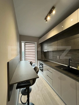Garsoniera de vanzare, 40 mp, parcare subterana, zona Tractoru - imagine 3