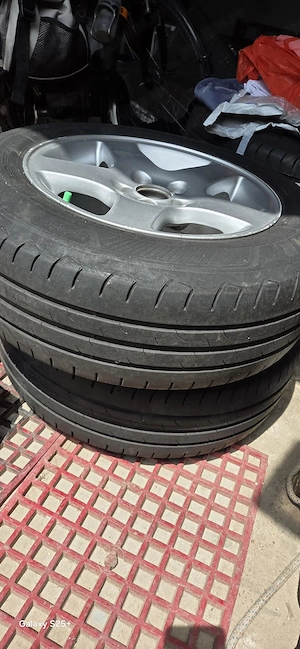 Vând set de 4 roți echipate cu cauciucuri vară Goodyear 195/65/15 H 5x100 Skoda Octavia 1 - imagine 2