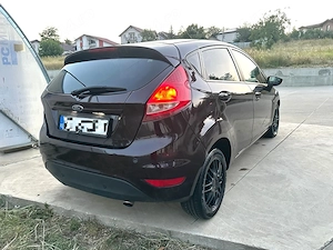 Ford Fiesta 2009, motor 1.6 TDCi 90 cai - imagine 3